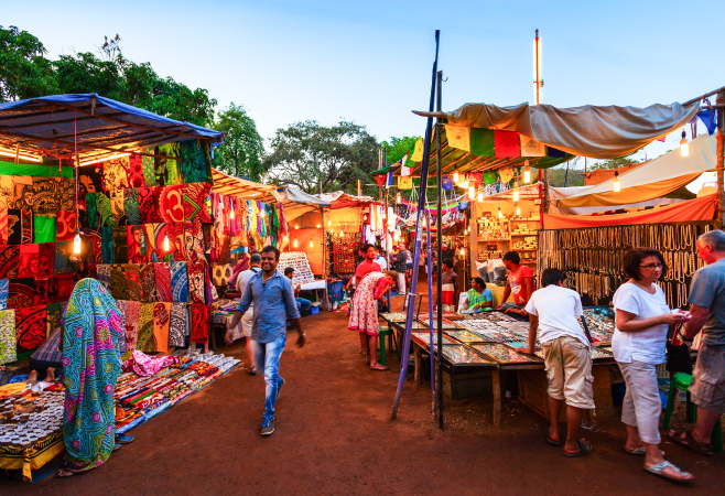Goa night market is a carnival of colors, sounds, and flavors! From typical Goan floral printed clothes to handcrafted jewelry unique to Goa.