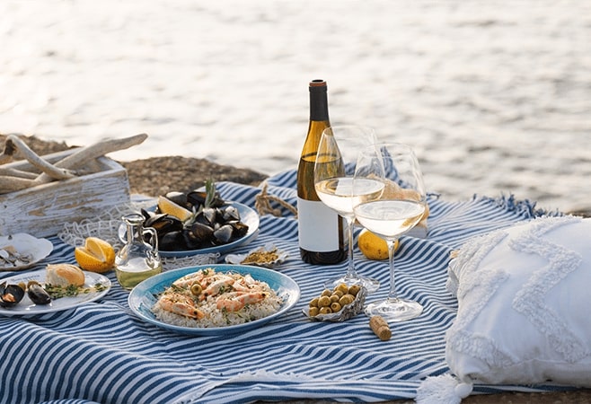 Seafood lovers can enjoy fresh prawns simmered in a coconut milk-based curry , spiced with black mustard seeds and curry leaves