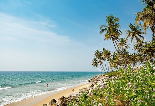 Varkala beach is perched high on a red sandstone cliff with sweeping views over the ocean