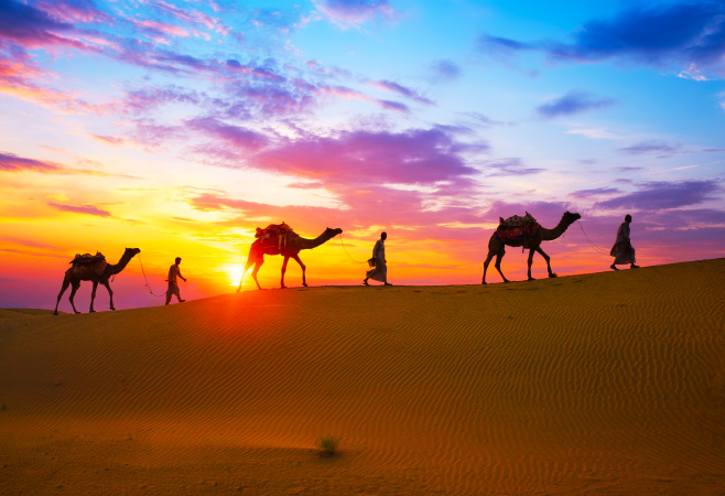 Its golden sands, camel rides, and vibrant Rajasthani culture make it a must-visit destination.