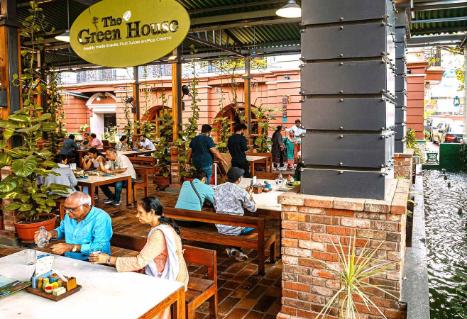 A courtyard cafe set amidst beautiful greenery under a covered pavilion, serves Indian and international snacks, fresh fruit juices and homemade ice creams.